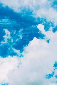 Beautiful blue sky with clouds background. Фото