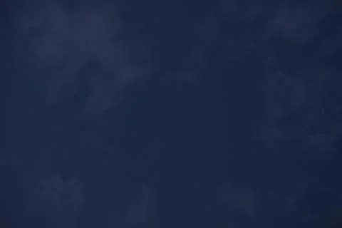 Beautiful blue sky with clouds in background Stock Photos