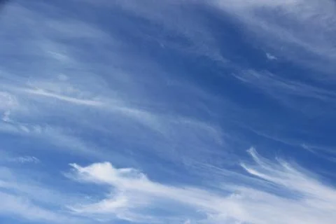Beautiful blue sky with clouds background. Stock Photos