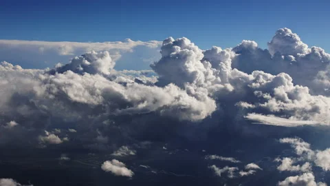 Beautiful blue sky with clouds background.Sky clouds timelapse from airplane Stock Footage 229907485