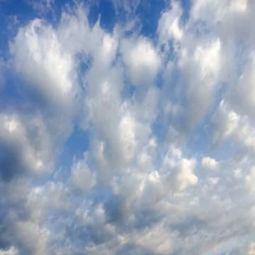Beautiful blue sky with clouds background.Sky clouds.Sky with clouds weather  Stock-Fotos