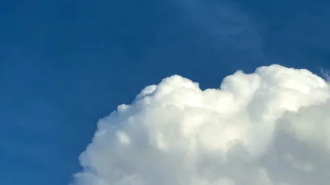 Beautiful blue sky with clouds on bright sunny day for abstract background Stock Footage 313589686