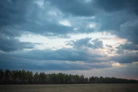 Beautiful Blue Sky with Dramatic Clouds. Nature Spectacles Stock Photos