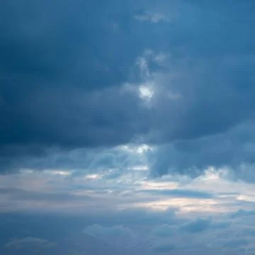 Beautiful Blue Sky with Dramatic Clouds. Nature Spectacles Stock Photos