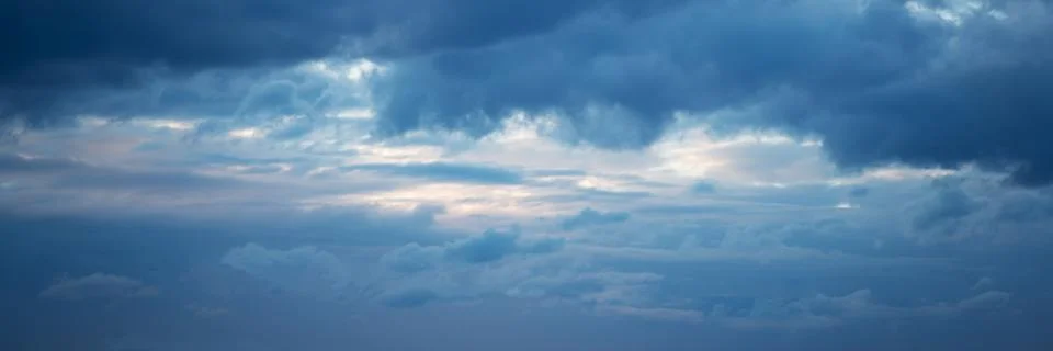 Beautiful Blue Sky with Dramatic Clouds. Nature Spectacles Stock Photos