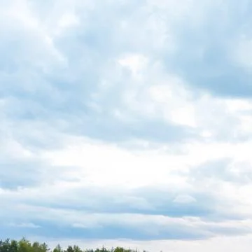 Beautiful Blue Sky with Dramatic Clouds. Nature Spectacles Stock Photos