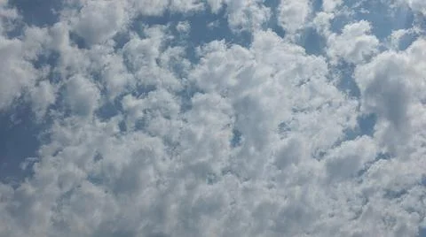 Beautiful blue sky with patterned altocumulus clouds Stock Photos