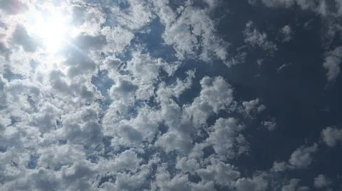 Beautiful blue sky with patterned altocumulus clouds Stock Photos