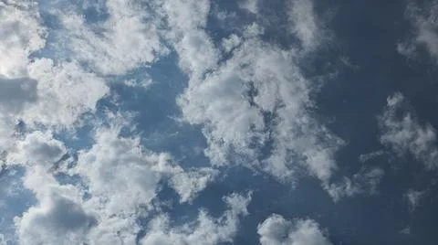 Beautiful blue sky with patterned altocumulus clouds Stock Photos