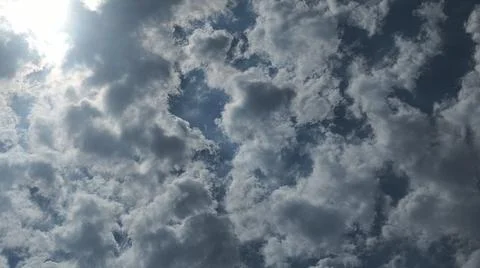 Beautiful blue sky with patterned altocumulus clouds Stock Photos
