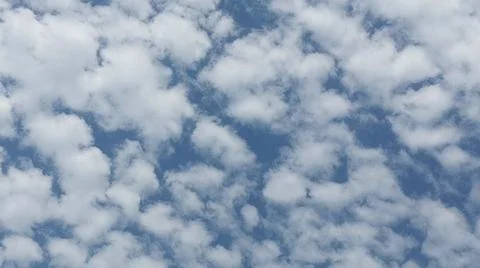 Beautiful blue sky with patterned altocumulus clouds Stock Photos