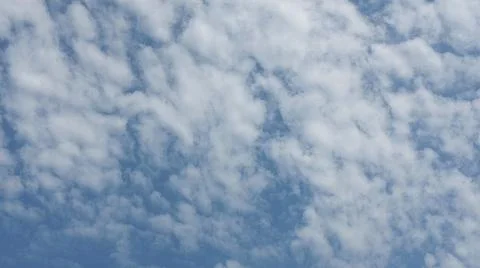 Beautiful blue sky with patterned altocumulus clouds Stock Photos