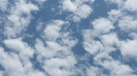 Beautiful blue sky with patterned altocumulus clouds Stock Photos