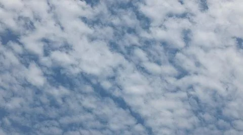 Beautiful blue sky with patterned altocumulus clouds Stock Photos