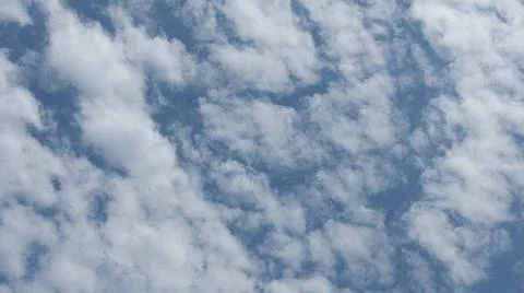 Beautiful blue sky with patterned altocumulus clouds Stock Photos