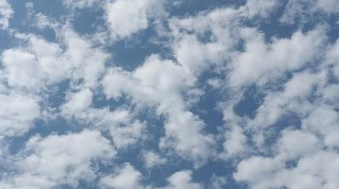 Beautiful blue sky with patterned altocumulus clouds Stock Photos