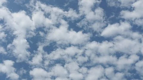 Beautiful blue sky with patterned altocumulus clouds Stock Photos