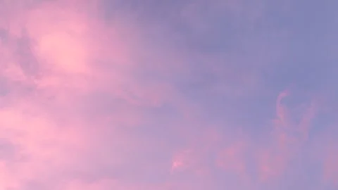 A beautiful blue sky with pink clouds Stock Footage 276344066