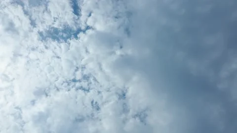 Beautiful blue sky with white clouds and sun Stock Footage 143704258