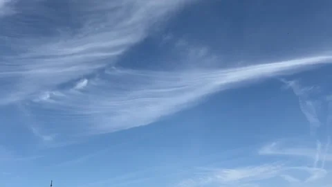 Beautiful blue sky with wispy cirrus clouds texture Stock Footage 335852863