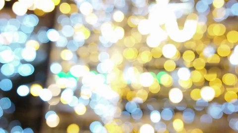 Beautiful blured multicolor bokeh effect.Glitter multicolored light spots Stock Footage 124628753