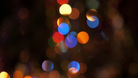 Beautiful blurred glowing blinking Christmas garland on the New Year tree Stock Footage 137689762