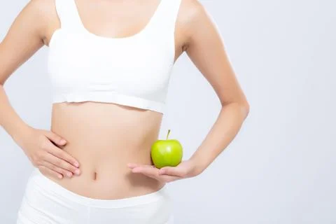 Beautiful body woman sexy slim holding green apple with cellulite for wellnes Stock Photos