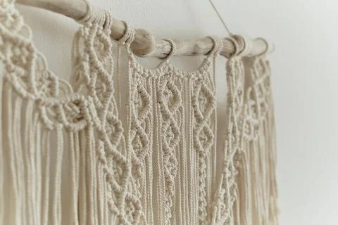 Beautiful boho macrame on wall panel. tapestry in the style of Boho made of Stock Photos