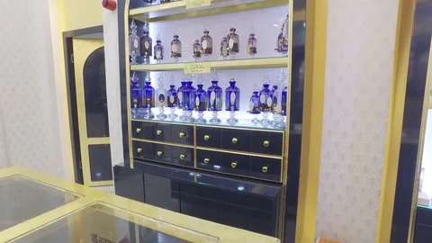 Beautiful bottles with perfume. Stock Footage 77689681