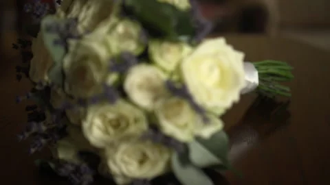 Beautiful bouquet of the bride on the table Stock Footage 168312977