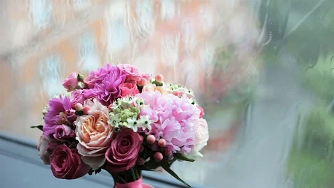Beautiful bouquet on the window Stock Footage 98854577