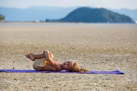Beautiful boy on the beach Stock Photos