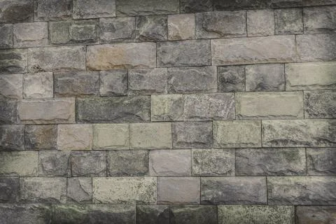 Beautiful brick wall. Texture for designer background. Photos