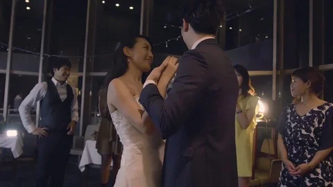 Beautiful Bride and greoom dancing at wedding reception party slow motion  스톡 동영상 77955043