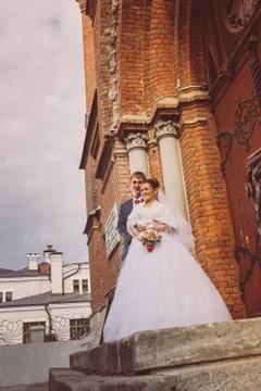 A beautiful bride and handsome groom at church during wedding Stock Photos