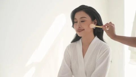 Beautiful bride doing makeup and hairstyle on ceremony wedding day Stock Footage 280205207