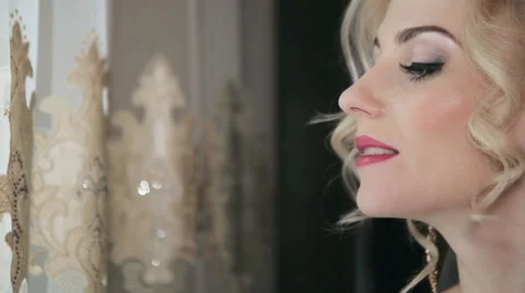 Beautiful Bride looking out a window Video stock 61173080