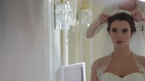 Beautiful bride in the mirror Stock Footage 32859903