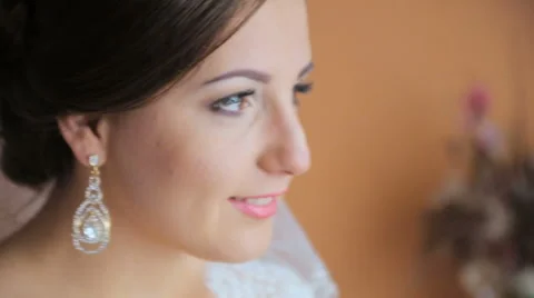 Beautiful bride posing for the camera Stock Footage 63625797