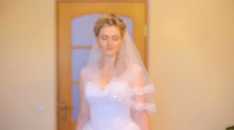 Beautiful bride posing for the camera Stock Footage 63759479