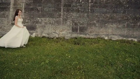 Beautiful Bride Runing Before Castle 動画素材 71065624