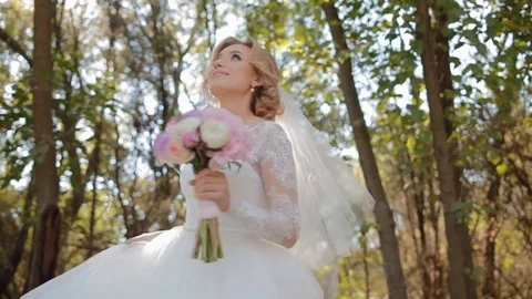 Beautiful bride spinning around Stock Footage 75674558