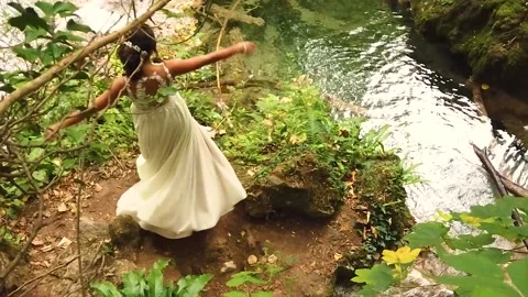 Beautiful Bride Spinning Around In The Forest Close To The River Stock Footage