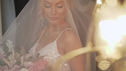 Beautiful bride in the studio under artificial light. Beautiful bride in the Stock Footage 158789101