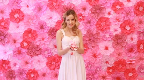 The beautiful bride throws rose petals Stock Footage 53799082