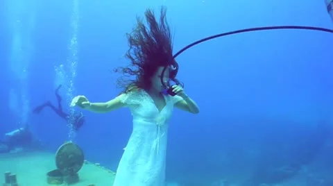 Beautiful bride under water Fashion shot. Stock Footage