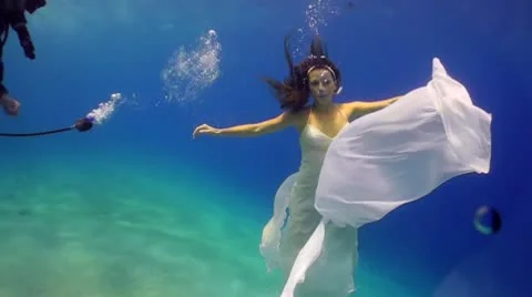 Beautiful bride under water Fashion shot 3 Stock Footage