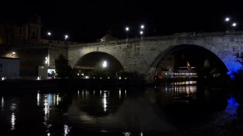 Beautiful Bridge Over A River at nigth, panoramic view- Rome, Italy Stock Footage 77552852