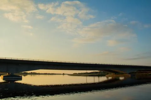 A beautiful bridge + reflection over a river during sunset in Athlone, Co Stock Photos