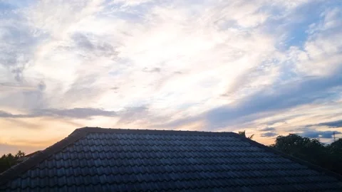 Beautiful Bright Blue Sky with Soft White Clouds Natural Background rooftop Stock Footage 336591443